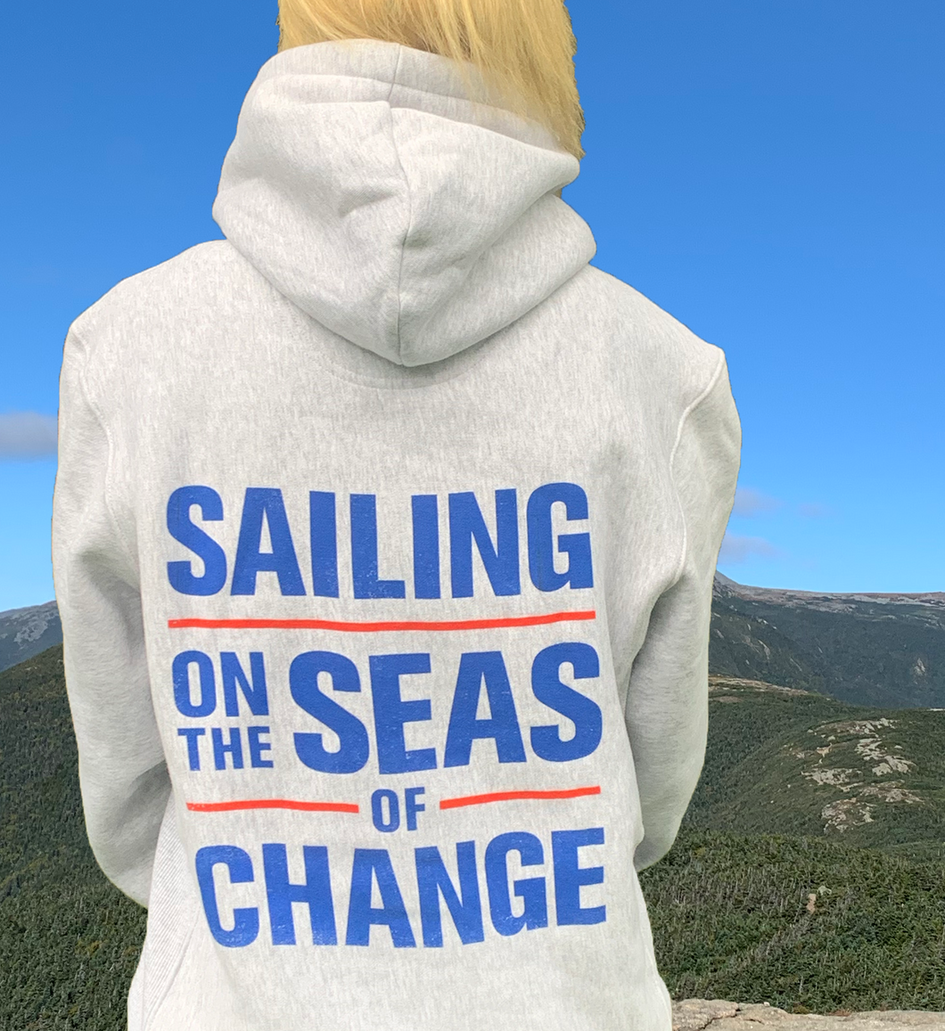 Sailing on the Seas of Change grey sweatshirt with blue lettering